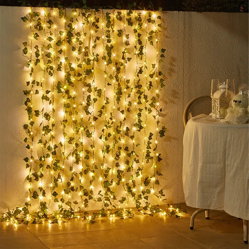Minimalistisk ljusslinga med blommor och blad bild 2
