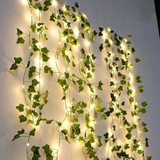 Minimalistisk ljusslinga med blommor och blad bild 1