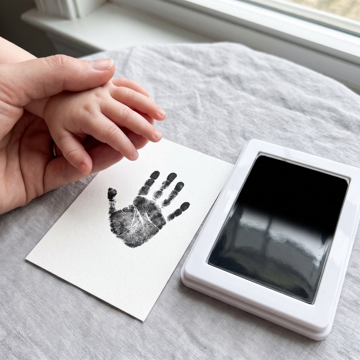 Ren babyhand efter avtryck – bläckfri metod