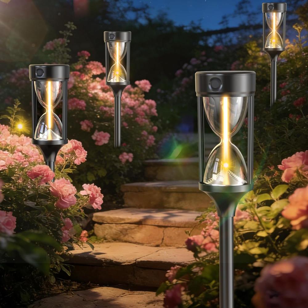 Timglas solcellslampor bland rosor trädgård